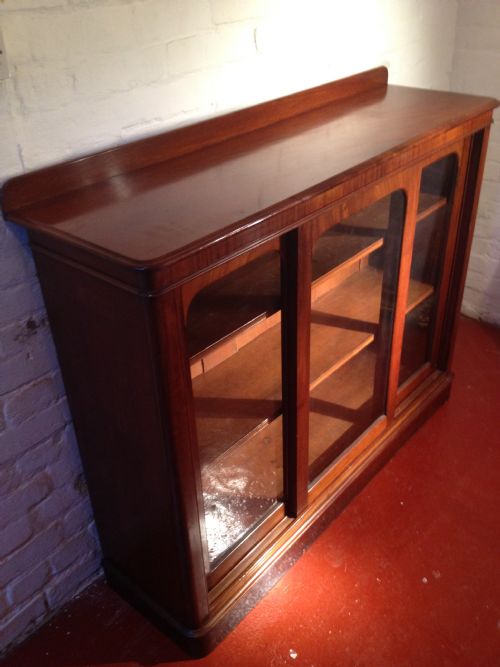 fig 2. VICTORIAN MAHOGANY TRIPLE SLIDING DOOR BOOKCASE