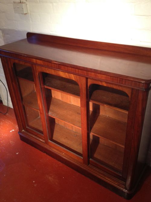VICTORIAN MAHOGANY TRIPLE SLIDING DOOR BOOKCASE View V