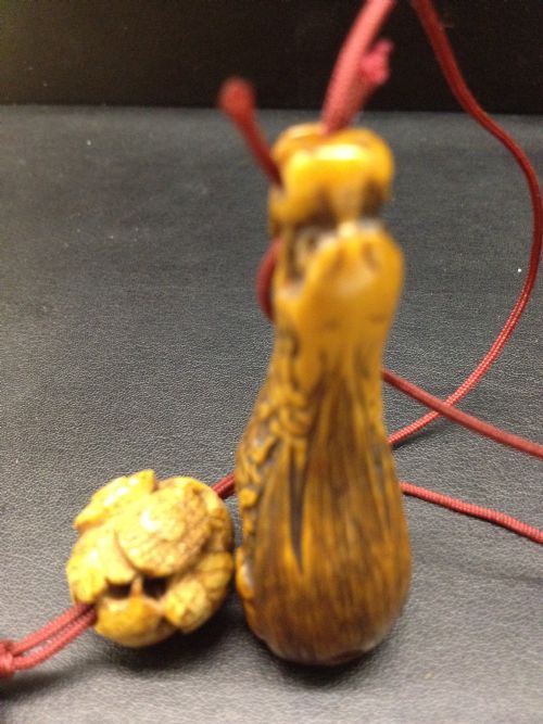 fig 1. JAPANESE STAINED IVORY NETSUKE AND OJIME MEIJI PERIOD 1868-1912