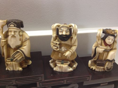7 JAPANESE IVORY OKIMONO WITH STAND OF CHINESE GODS View IV