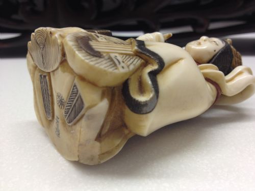 7 JAPANESE IVORY OKIMONO WITH STAND OF CHINESE GODS View V