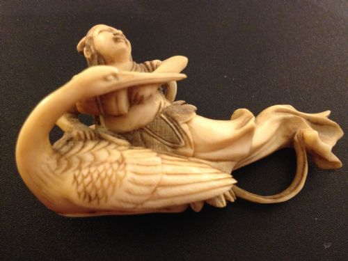 fig 1. JAPANESE IVORY NETSUKE OF LADY RIDING A CRANE
