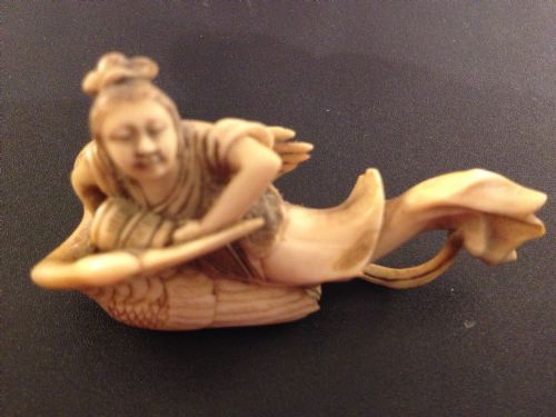  JAPANESE IVORY NETSUKE OF LADY RIDING A CRANE View IV