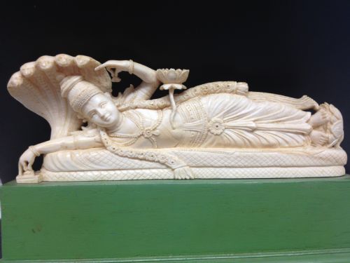 Fine Quality Indian Ivory Reclining Goddess on Stand