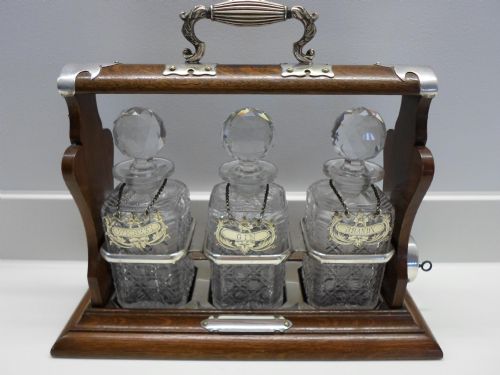 Unusual Walker and Hall Tiger Oak and Silver Plated Tantalus - Hold Fast Patent