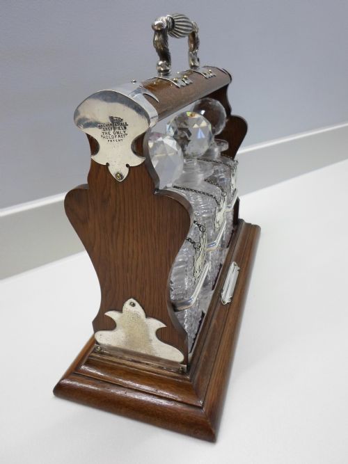 fig 1. UNUSUAL WALKER AND HALL TIGER OAK AND SILVER PLATED TANTALUS - HOLD FAST PATENT