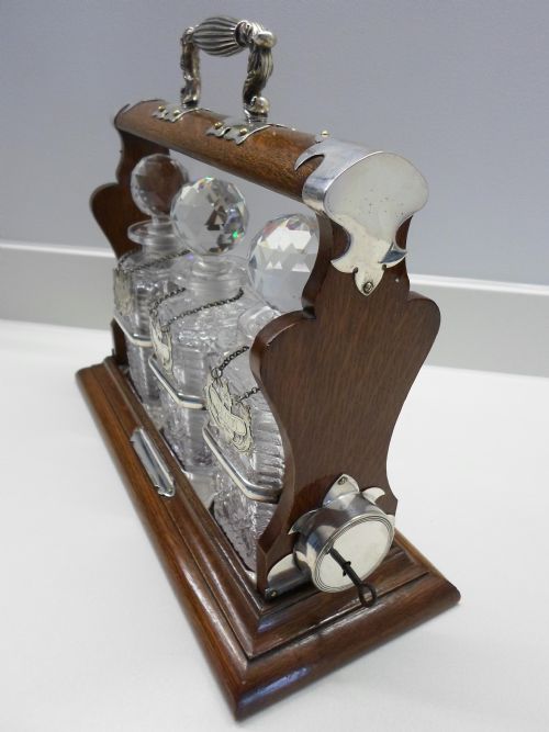 fig 2. UNUSUAL WALKER AND HALL TIGER OAK AND SILVER PLATED TANTALUS - HOLD FAST PATENT