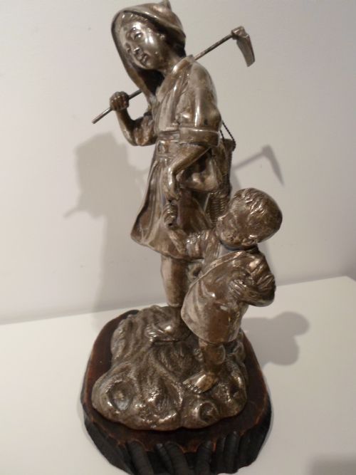 fig 1. FINE QUALITY JAPANESE SILVERED OKIMONO FEMALE WORKER WITH BOY - SIGNED