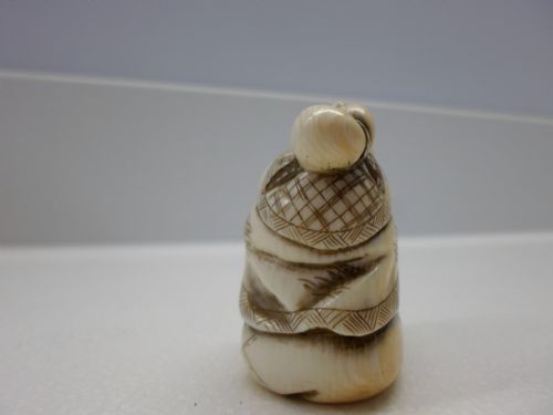 fig 1. JAPANESE SIGNED IVORY NETSUKE OF AN ELDER