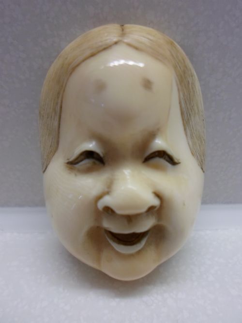 fig 1. SET OF THREE JAPANESE IVORY NOH MASK NETSUKE MEIJI PERIOD