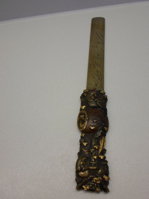 fig 1. JAPANESE BRONZE AND MIXED METAL PAGE TURNER 