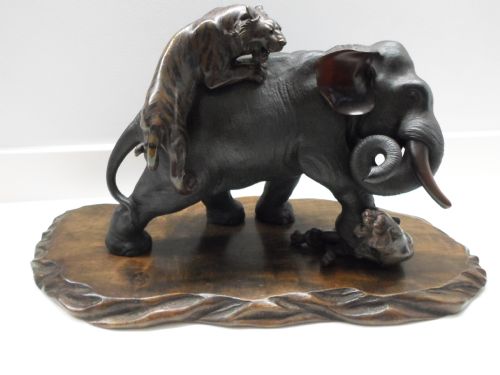 A Large Japanese Bronze Elephant and Tiger Group by Seiya