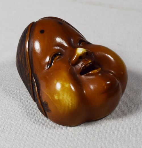 DELIGHTFUL JAPANESE IVORY NETSUKE OF OKAME SIGNED JYOGYOKU - ADDITIONAL PHOTO 1