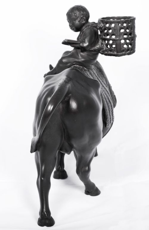 LARGE JAPANESE BRONZE OKIMONO OF A BOY SEATED UPON AN OXEN - ADDITIONAL PHOTO 8