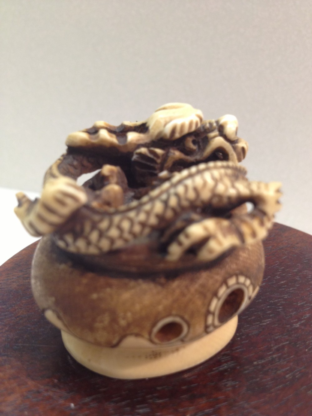 JAPANESE IVORY NETSUKE DRAGON RISING FROM CENSOR MEIJI PERIOD