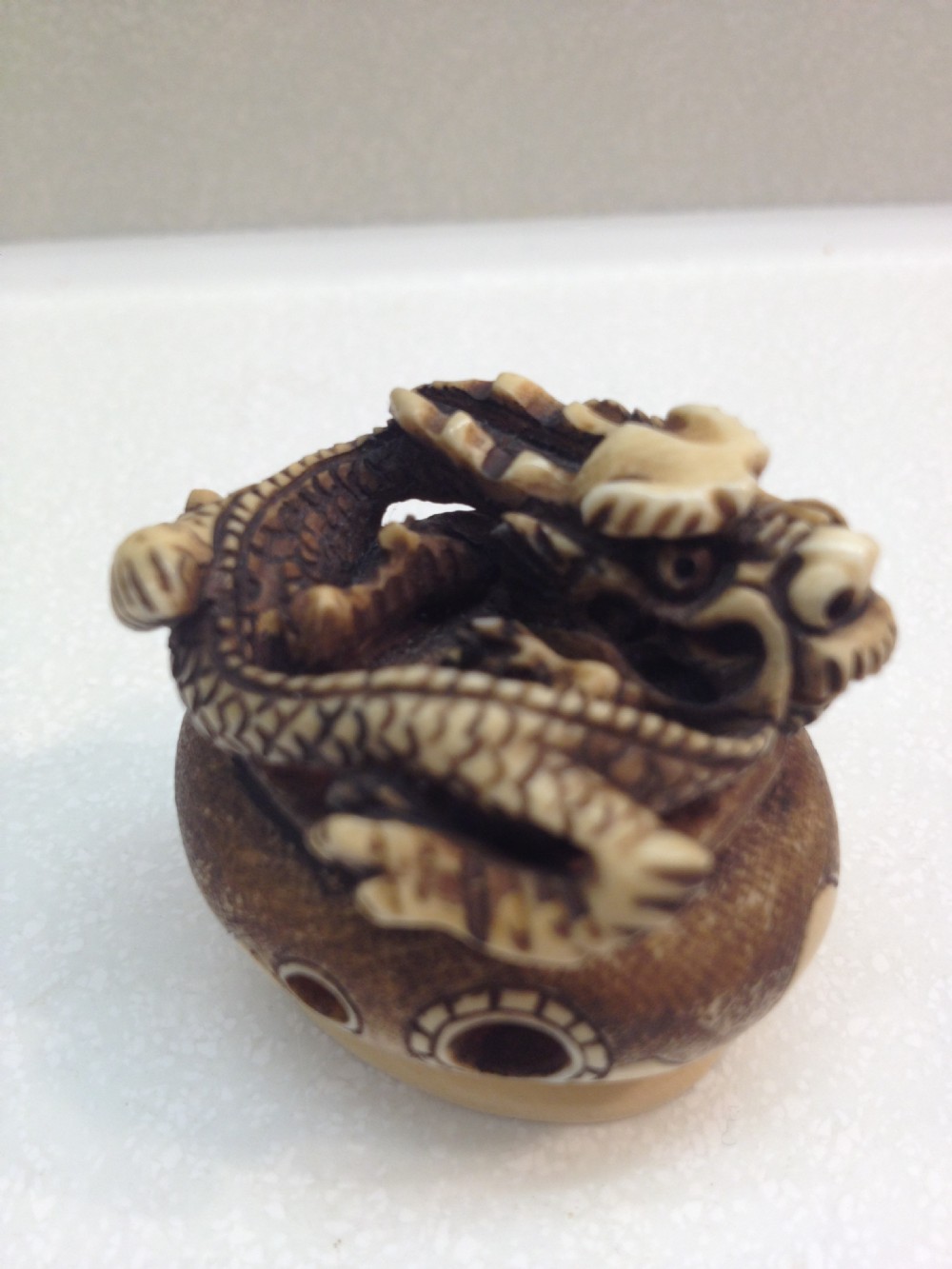 JAPANESE IVORY NETSUKE DRAGON RISING FROM CENSOR MEIJI PERIOD View VIII