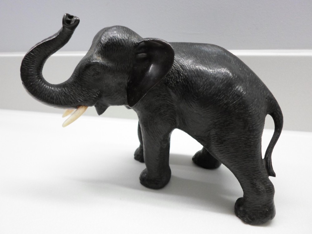 A LOVELY JAPANESE BRONZE ELEPHANT SIGNED MEIJI PERIOD 