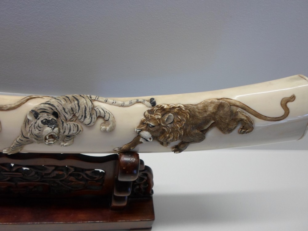 LARGE JAPANESE CARVED IVORY TUSK ON STAND , LIONS,TIGERS,MONKEY. View IX