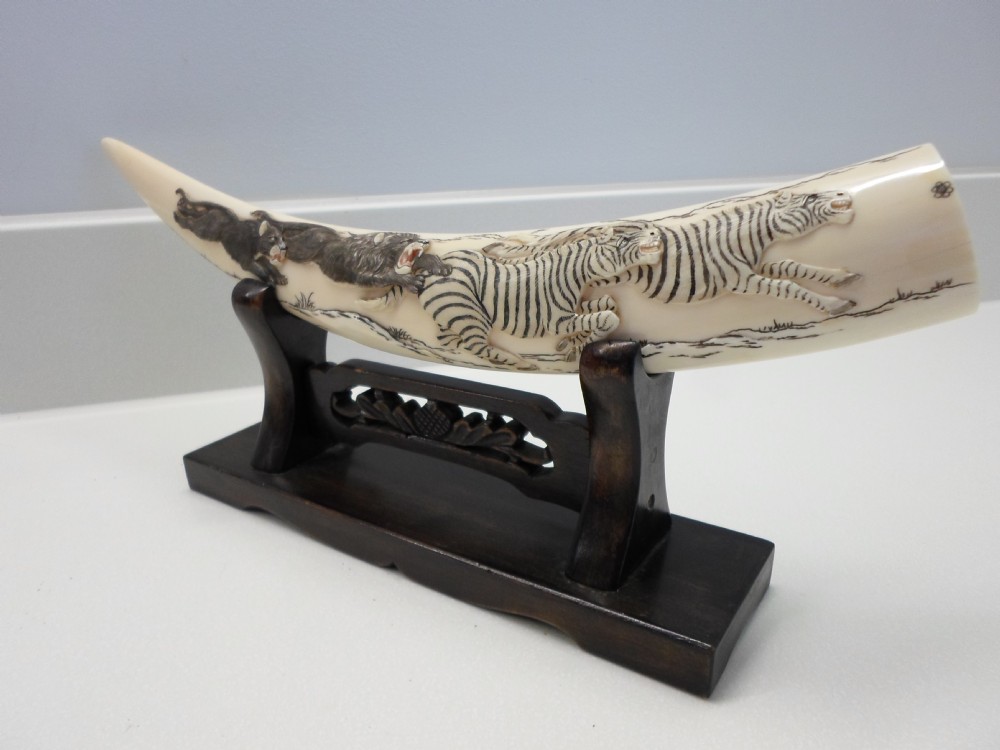 JAPANESE IVORY TUSK ON STAND LIONS AND ZEBRA View II