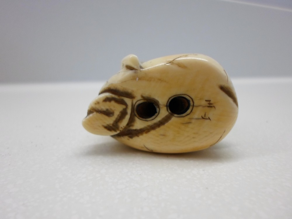 JAPANESE SIGNED IVORY NETSUKE OF AN ELDER  View V