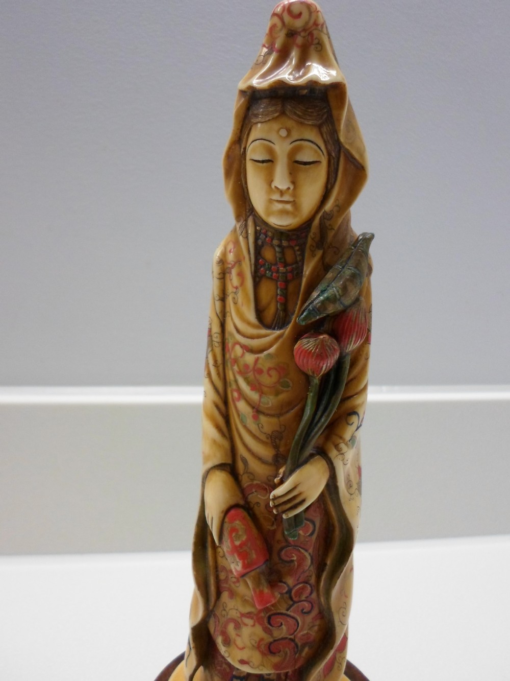 RARE 19TH CENTURY JAPANESE PAINTED IVORY OKIMONO OF KANNON (KUAN-YIN) View V
