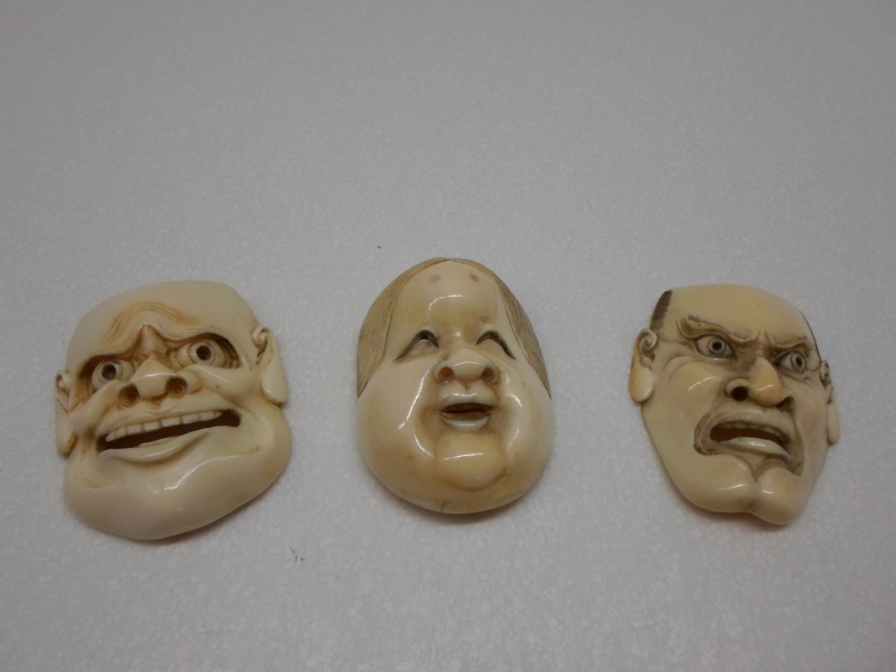 SET OF THREE JAPANESE IVORY NOH MASK NETSUKE MEIJI PERIOD