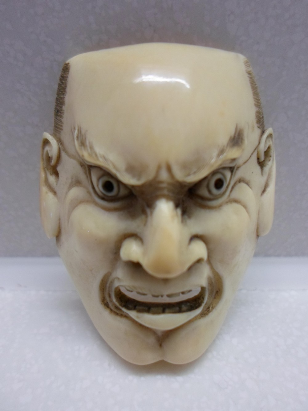 SET OF THREE JAPANESE IVORY NOH MASK NETSUKE MEIJI PERIOD View III