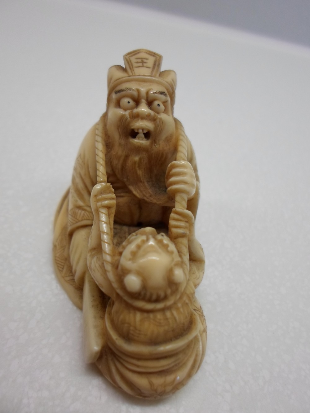 HUMEROUS JAPANESE IVORY NETSUKE MEIJI PERIOD View V