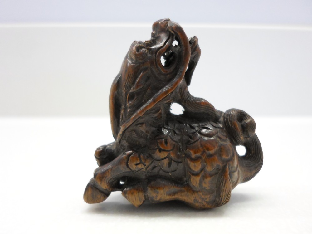 JAPANESE BOXWOOD KYLIN NETSUKE SIGNED