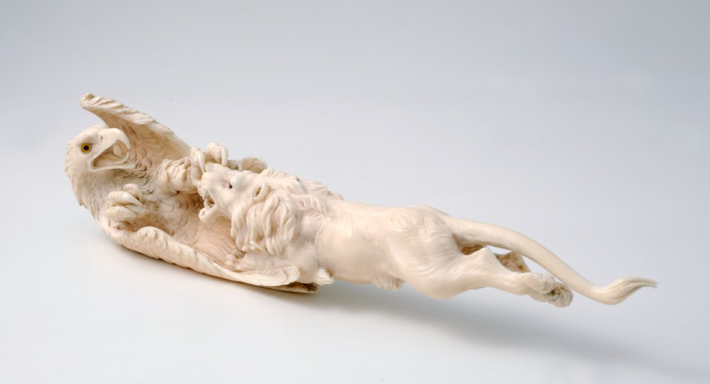 FINE QUALITY JAPANESE IVORY OKIMONO LION AND EAGLE View II