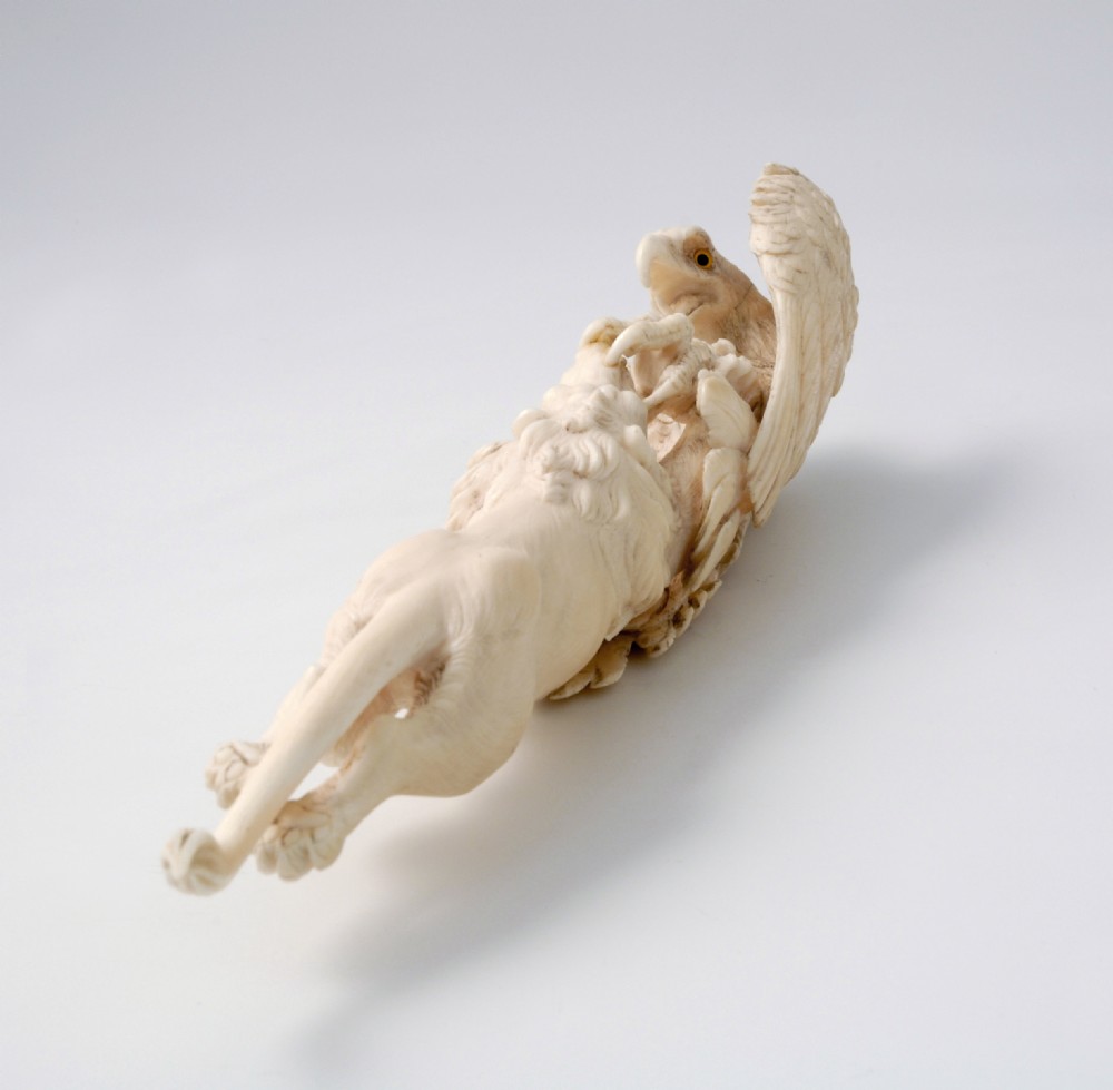 FINE QUALITY JAPANESE IVORY OKIMONO LION AND EAGLE View III