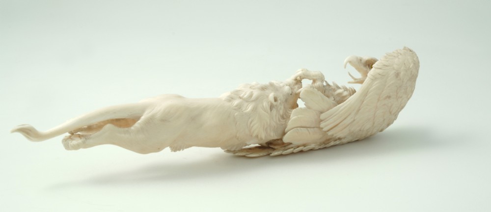 FINE QUALITY JAPANESE IVORY OKIMONO LION AND EAGLE View IV