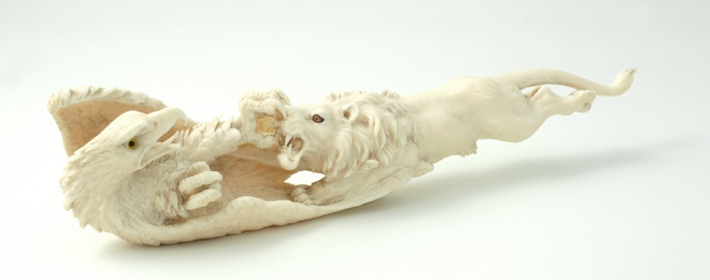 FINE QUALITY JAPANESE IVORY OKIMONO LION AND EAGLE View VI