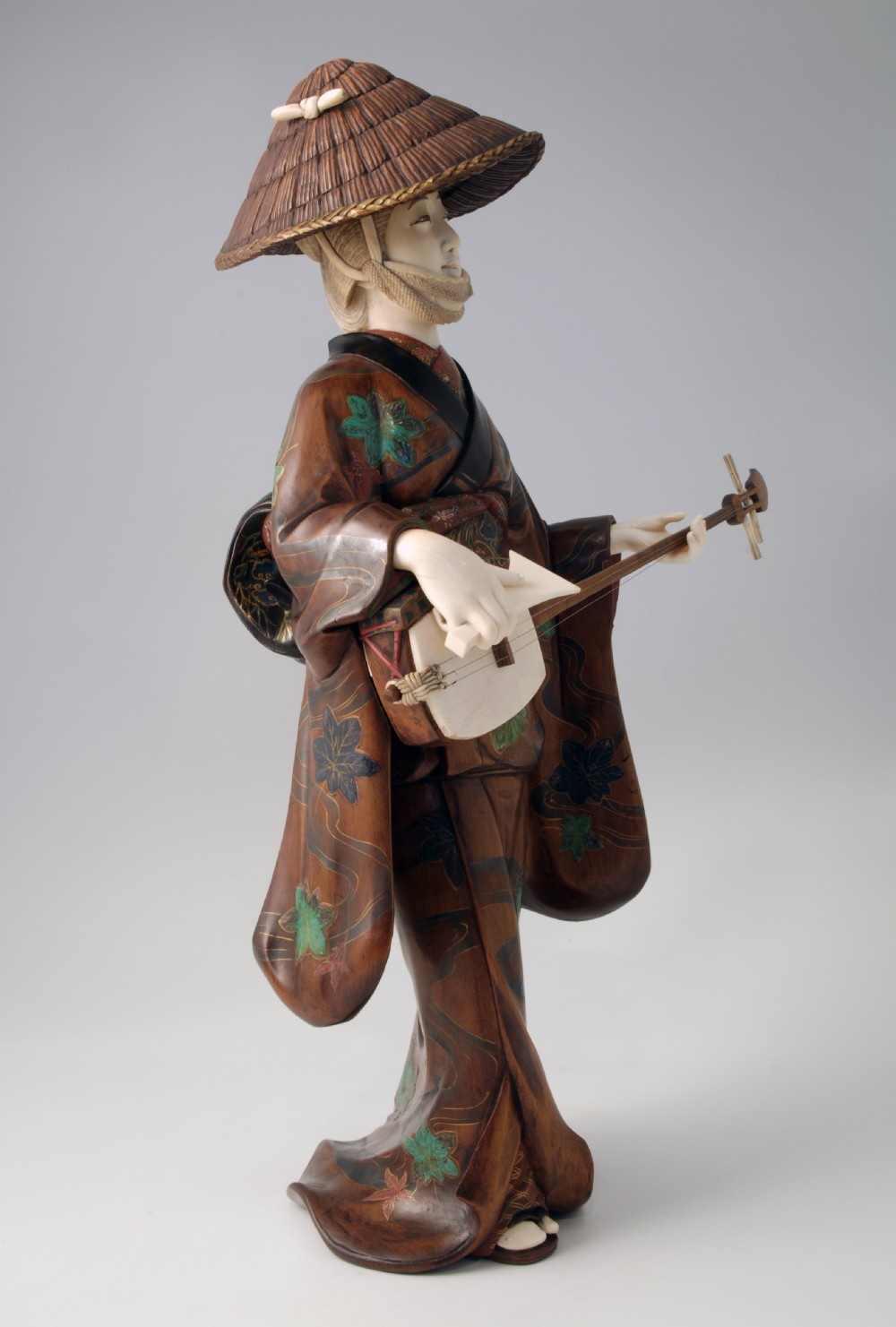 LARGE JAPANESE WOOD AND IVORY OKIMONO MUSICIAN View VII