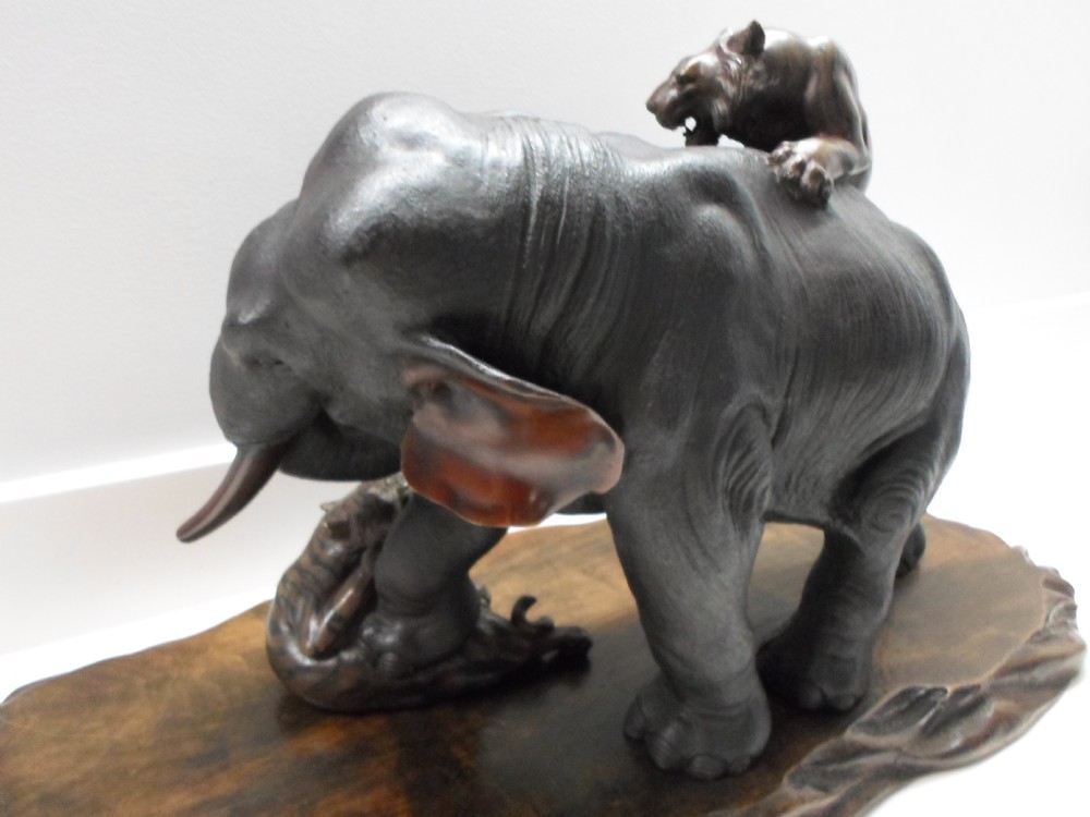 A LARGE JAPANESE BRONZE ELEPHANT AND TIGER GROUP BY SEIYA View VII