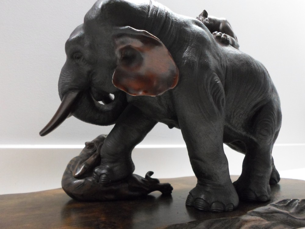 A LARGE JAPANESE BRONZE ELEPHANT AND TIGER GROUP BY SEIYA View VIII