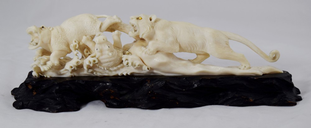 FINE QUALITY JAPANESE IVORY OKIMONO LIONESS AND HIPPO'S