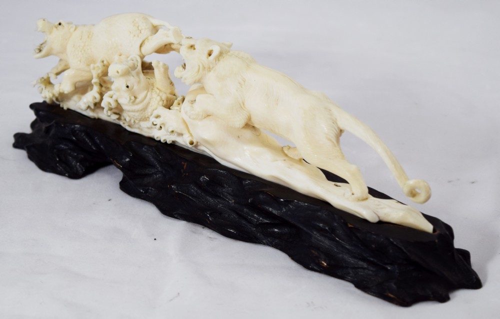 FINE QUALITY JAPANESE IVORY OKIMONO LIONESS AND HIPPO'S View III