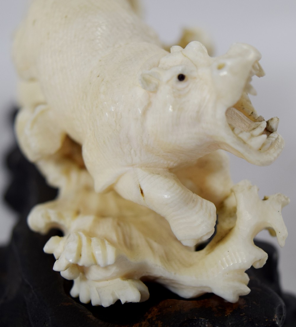 FINE QUALITY JAPANESE IVORY OKIMONO LIONESS AND HIPPO'S View IV
