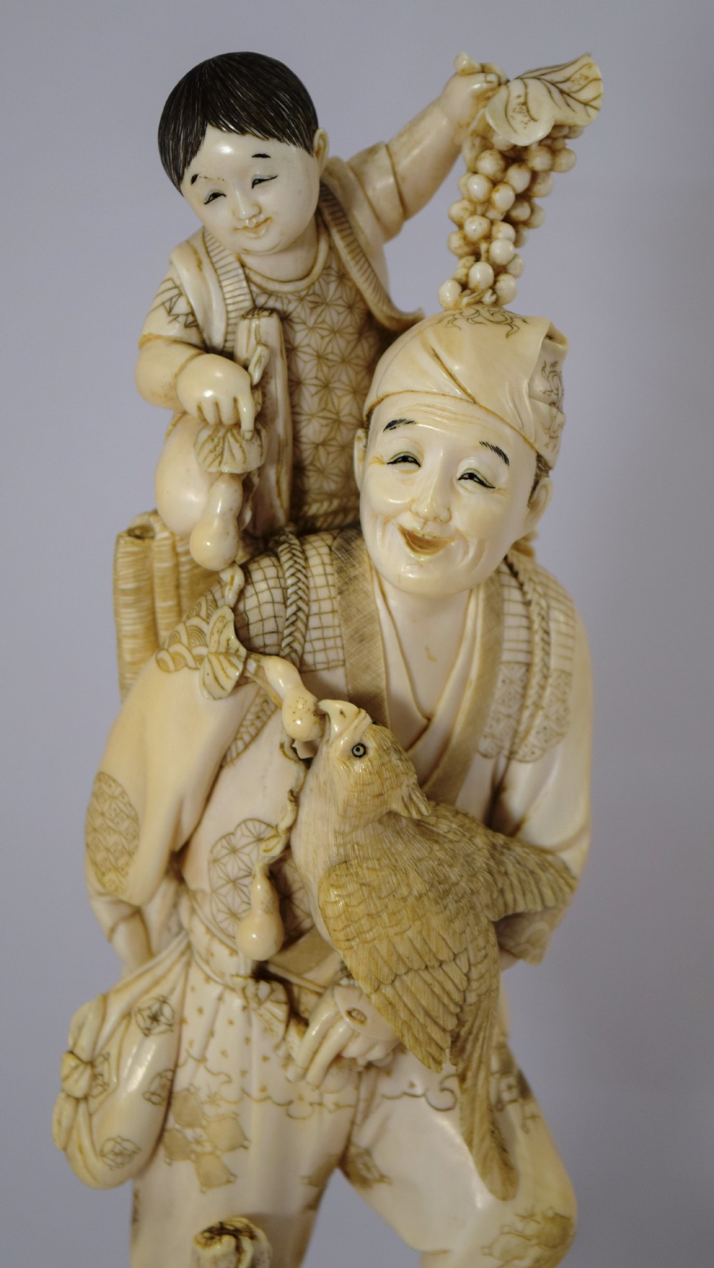 LARGE JAPANESE IVORY OKIMONO ON STAND FATHER SON AND COCKATIEL View V