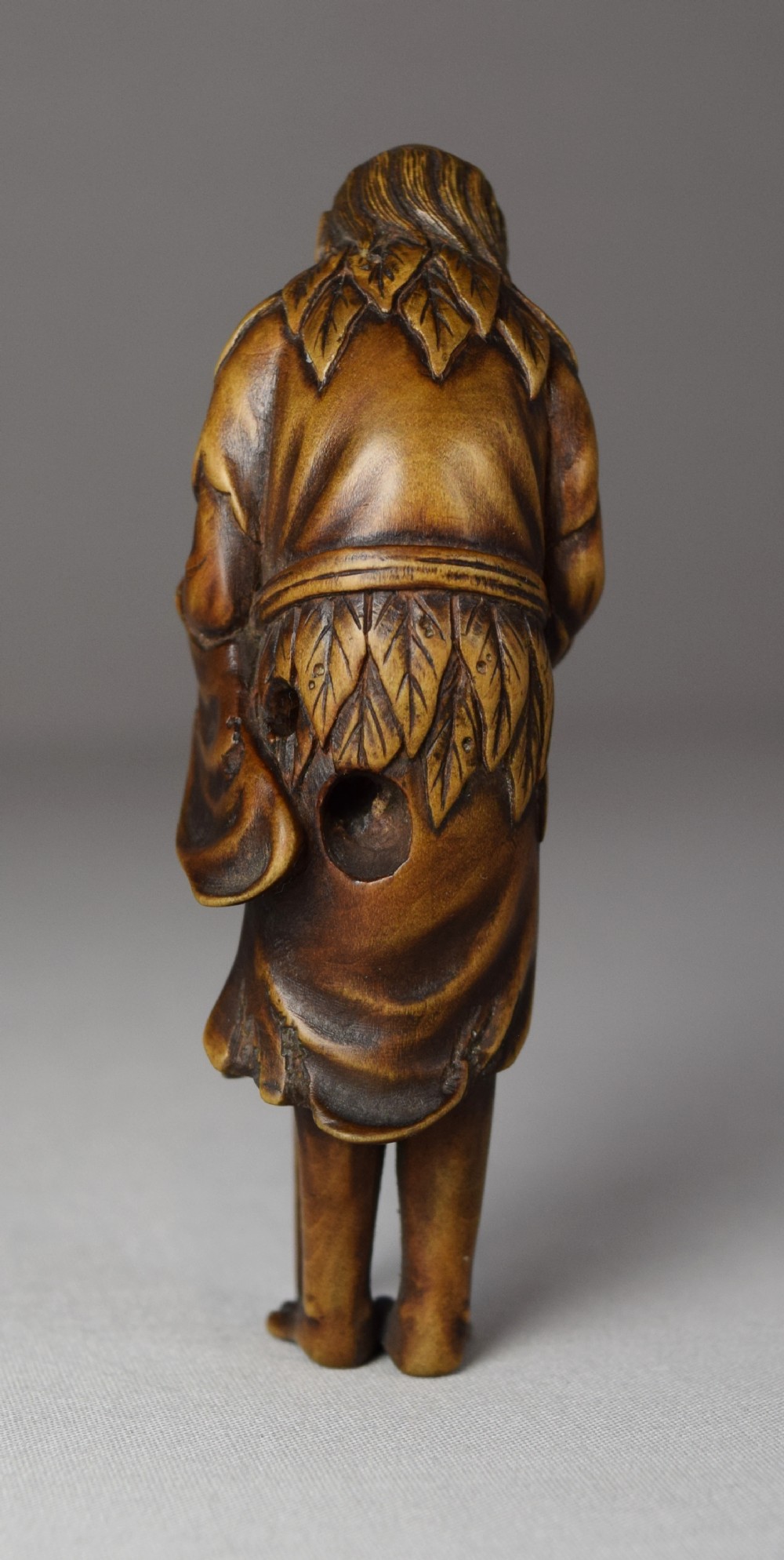 JAPANESE WOODEN NETSUKE OF TOBOSAKU (PEACH SENNIN) View IV