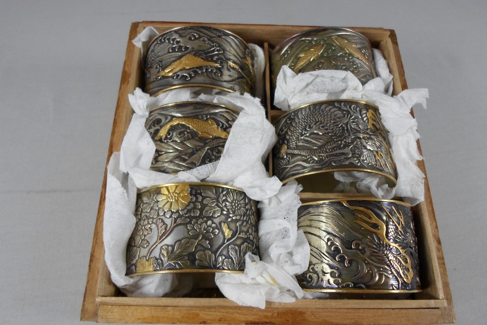 SET OF SIX JAPANESE MIXED METAL NAPKIN RINGS IN TOMOBAKO View II