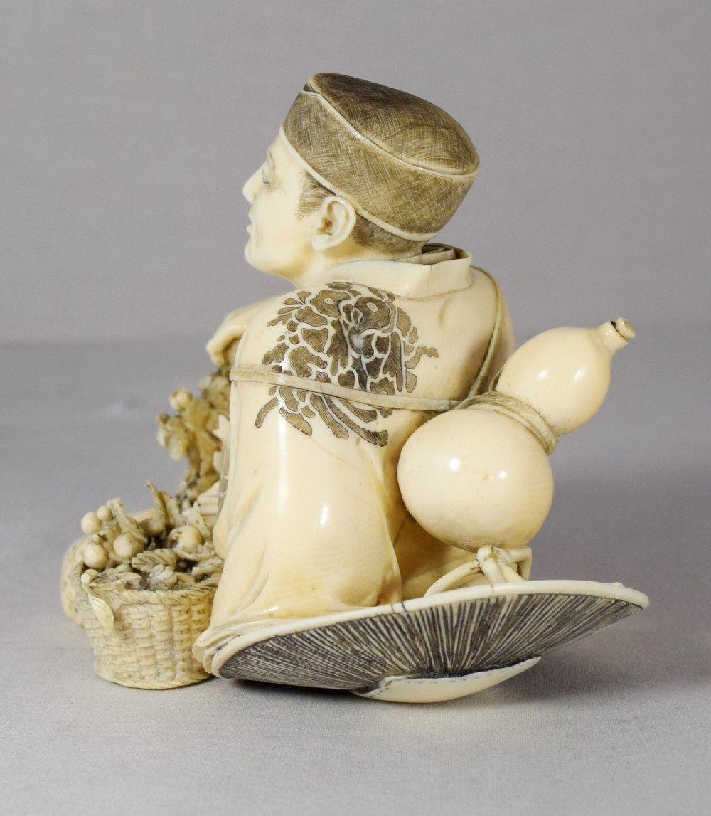 A FINELY DRAWN JAPANESE IVORY OKIMONO SIGNED MUNETOSHI View VI