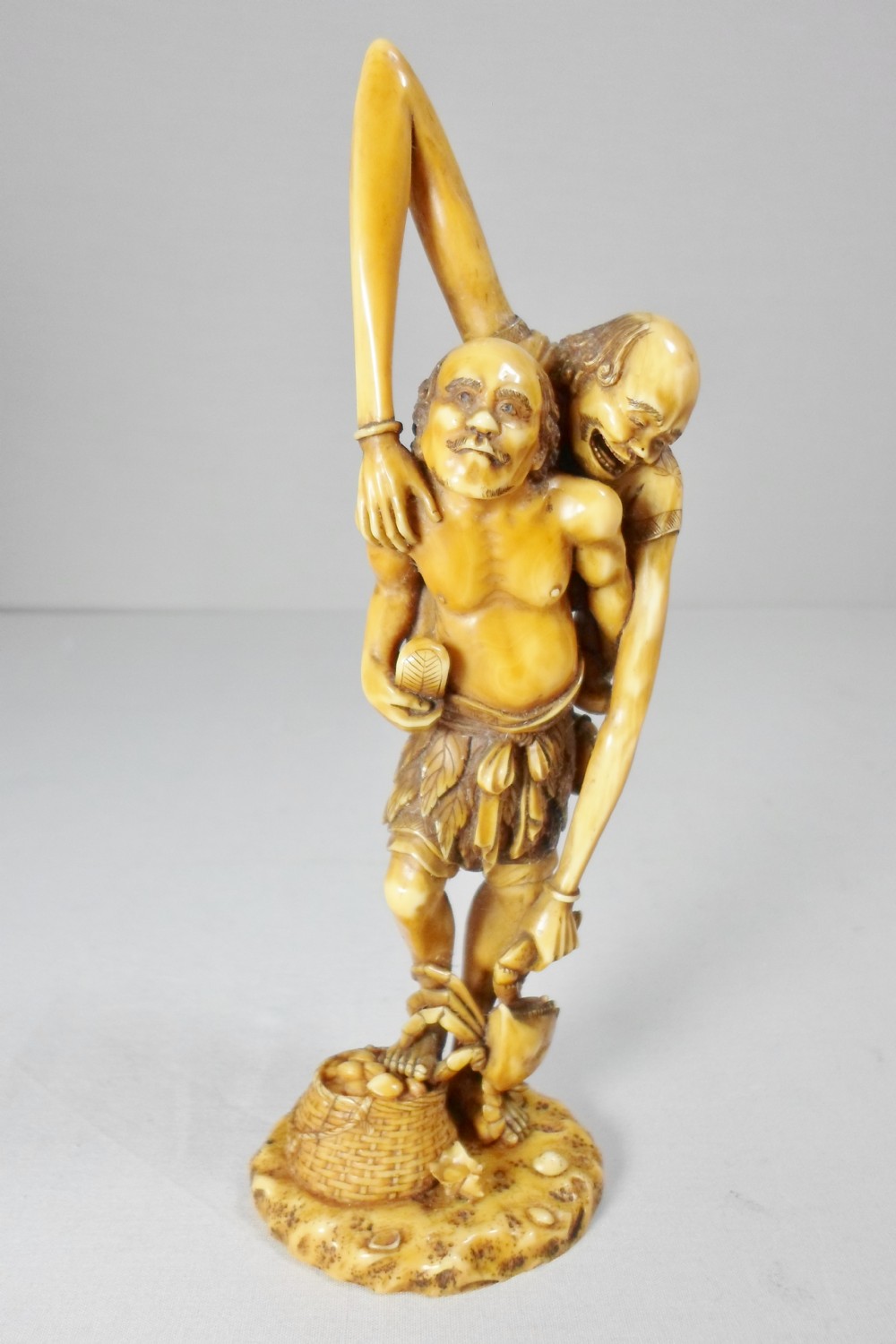 an unusual japanese ivory okimono of ashinaga and tenaga - CATEGORY: ANTIQUE MISCELLANEOUS - DATED 1890