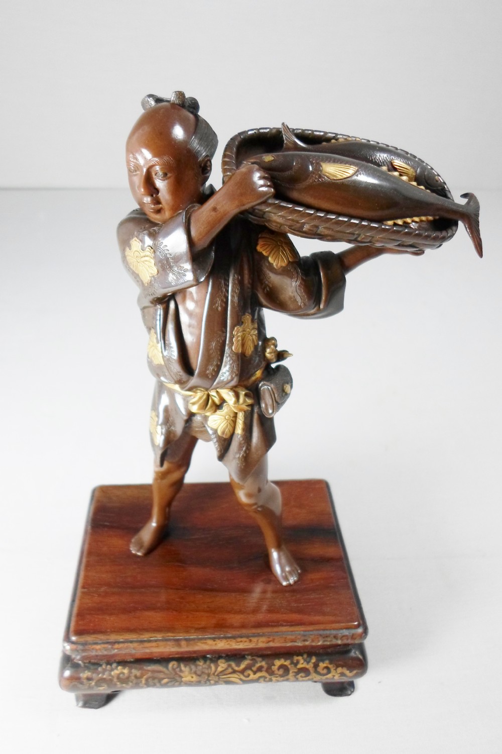 A GOOD JAPANESE MIYAO EISUKE PARCEL GILT BRONZE OKIMONO View II
