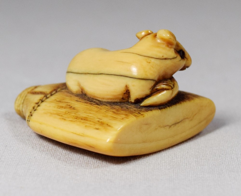 DELIGHTFUL JAPANESE RAT ON A BROOMHEAD IVORY NETSUKE View III