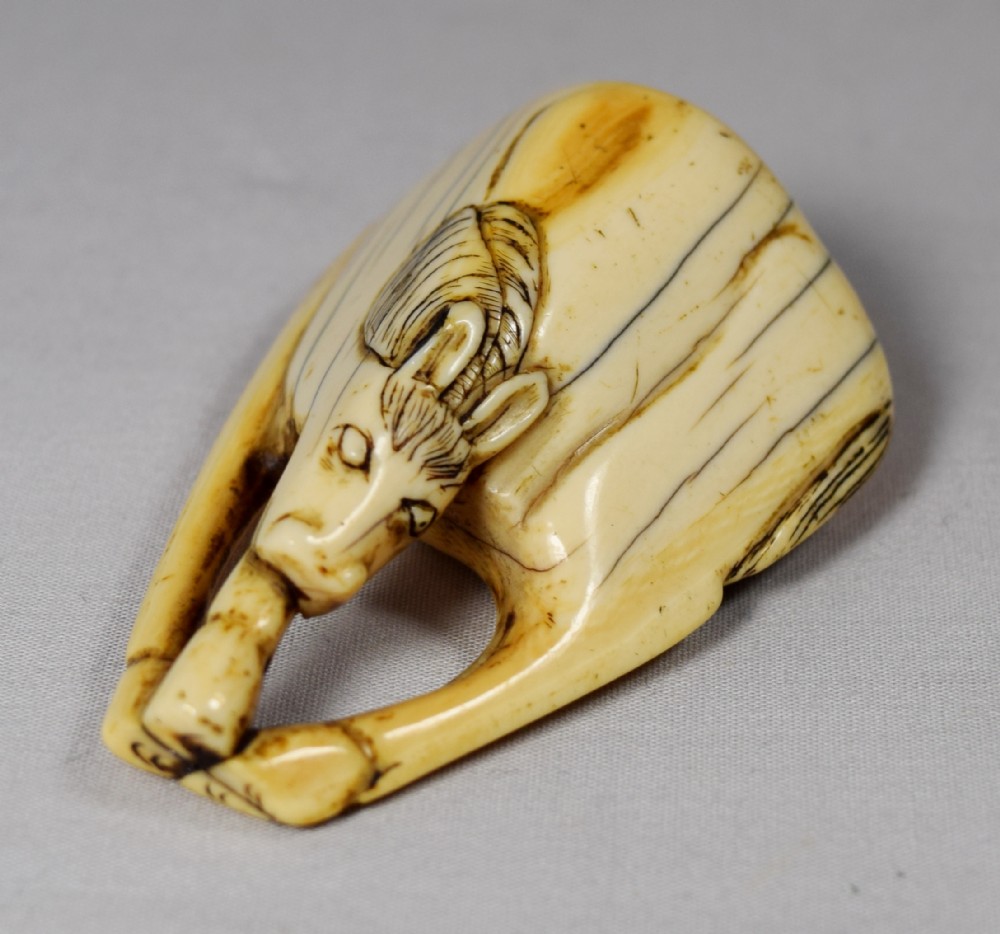 A LARGE JAPANESE EDO PERIOD IVORY HORSE NETSUKE View II