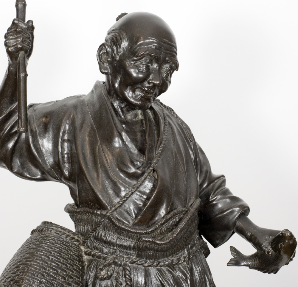 A LARGE TOKYO SCHOOL JAPANESE BRONZE OKIMONO FISHERMAN BY SEIYA View VII