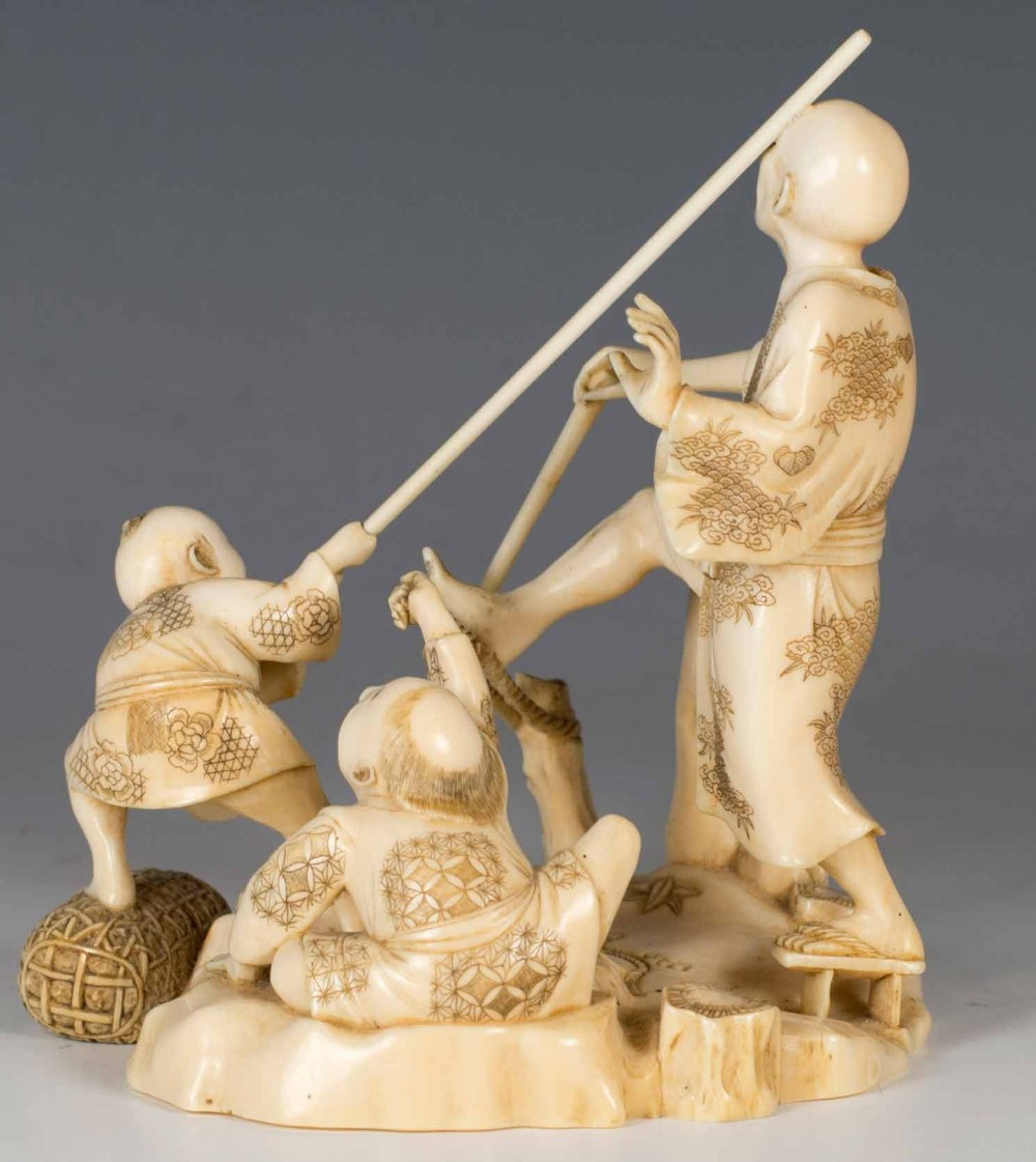 HUMEROUS JAPANESE IVORY OKIMONO GROUP SIGNED GYOKUSUI View VIII