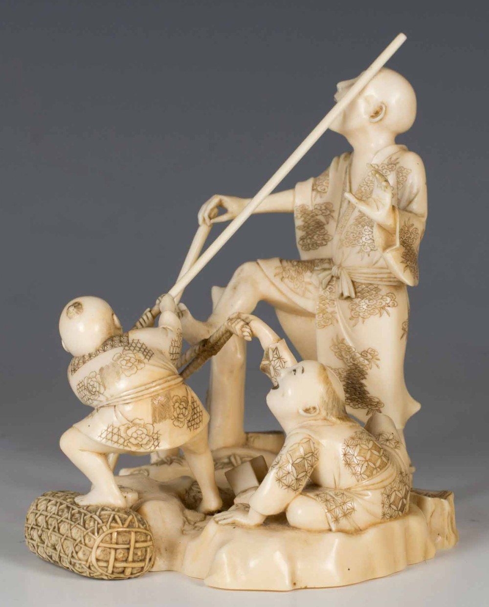 HUMEROUS JAPANESE IVORY OKIMONO GROUP SIGNED GYOKUSUI View IX